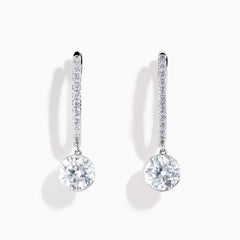 Star Lab Grown Diamond Pave Hoop Solitaire Earrings in 18K White Gold, featuring pavé-set diamonds along the hoop and a large round solitaire gem at the end, displayed on a white background.