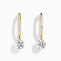 Star Lab Grown Diamond Pave Hoop Solitaire Drop Earrings in 18K Yellow Gold feature a row of small round lab grown diamonds on each hoop and a larger solitaire diamond drop, shown against a white background.