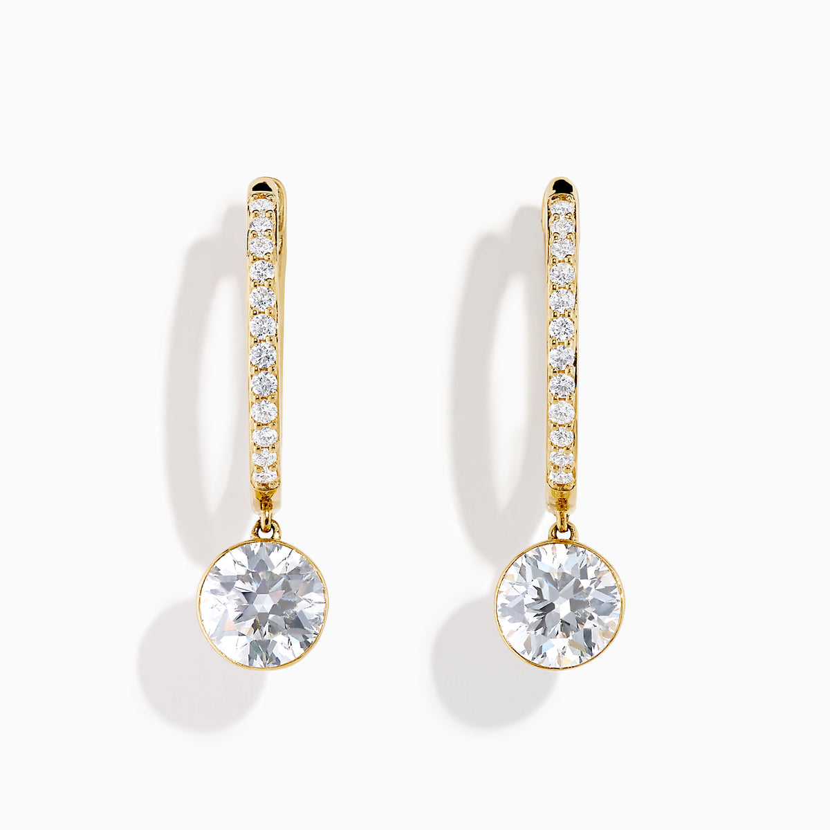Star Lab Grown Diamond Pave Hoop Solitaire Drop Earrings in 18K Yellow Gold feature a row of small round lab grown diamonds on each hoop and a larger solitaire diamond drop, shown against a white background.