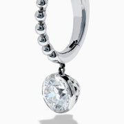 The Star Lab Grown Diamond Beaded Hoop Solitaire Drop Earrings in 18K White Gold feature a round lab-grown diamond dangling from each hoop, photographed on a white background.
