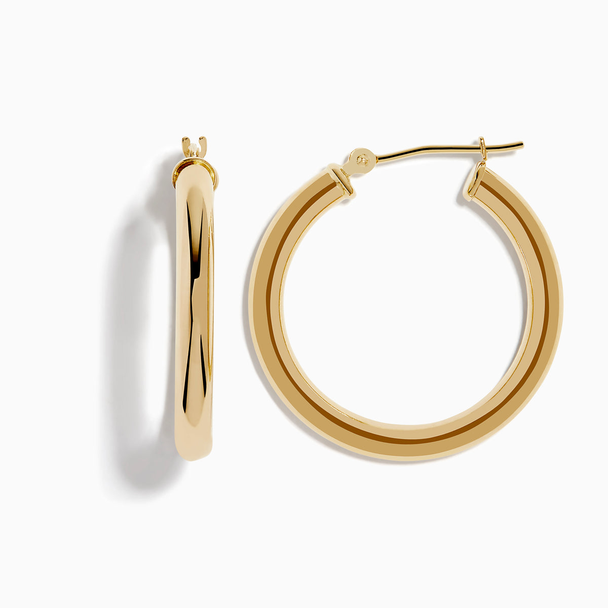 A pair of 14K Yellow Gold Hollow Round Hoop Earrings is shown on a white background, with soft shadows cast to the left.