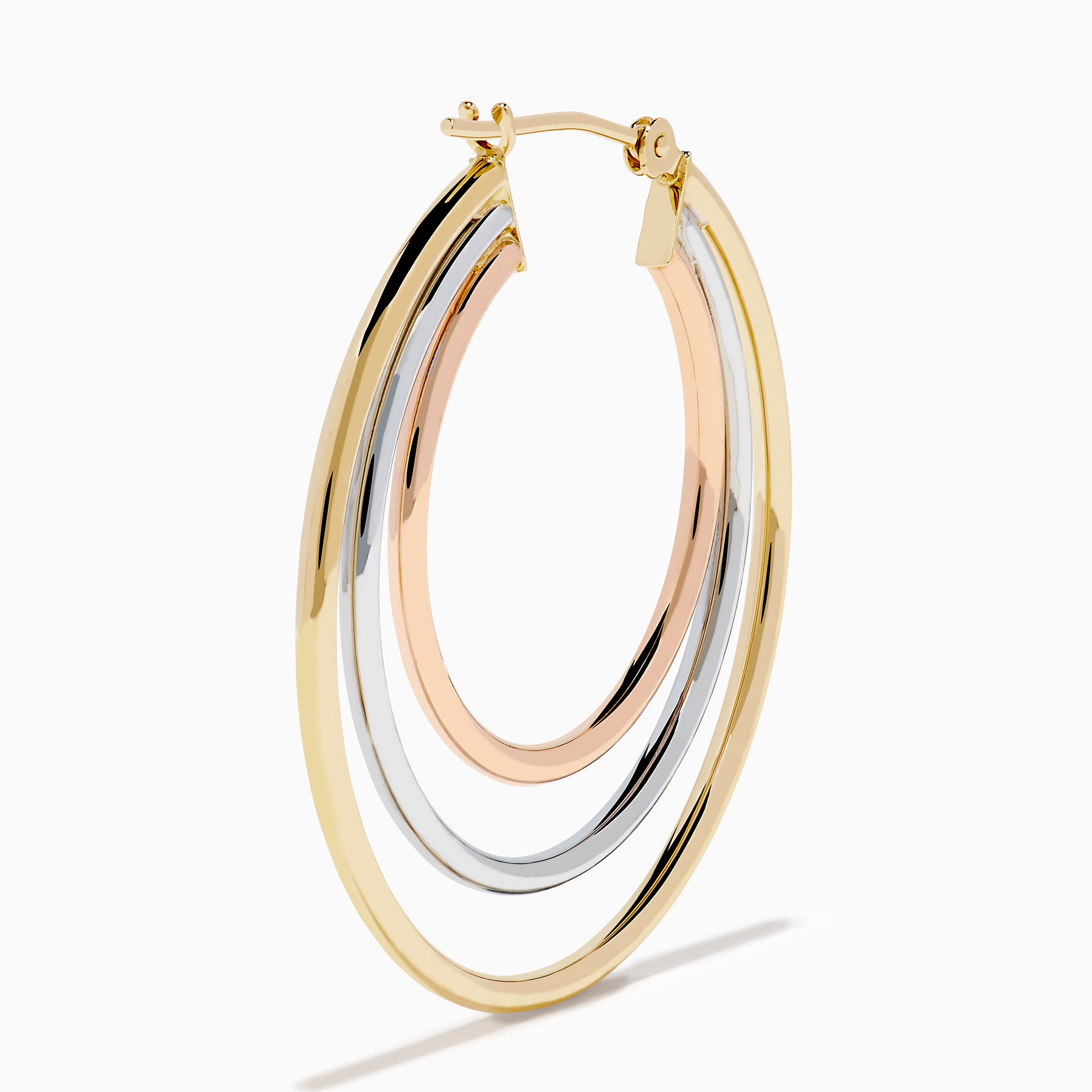 The 14K Three Tone Gold Triple Tube Hoop Earrings are displayed against a white background, with one earring shown front-facing and the other in a side view to highlight the intertwined gold, silver, and rose gold bands.