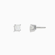 Pair of 14K white gold solitaire stud earrings, each with a princess cut diamond (0.98 TCW), displayed on a plain white background.