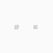 A pair of 14K White Gold Diamond Solitaire Stud Earrings, 0.25 TCW, with square-shaped stones and silver prongs, displayed on a plain white background.