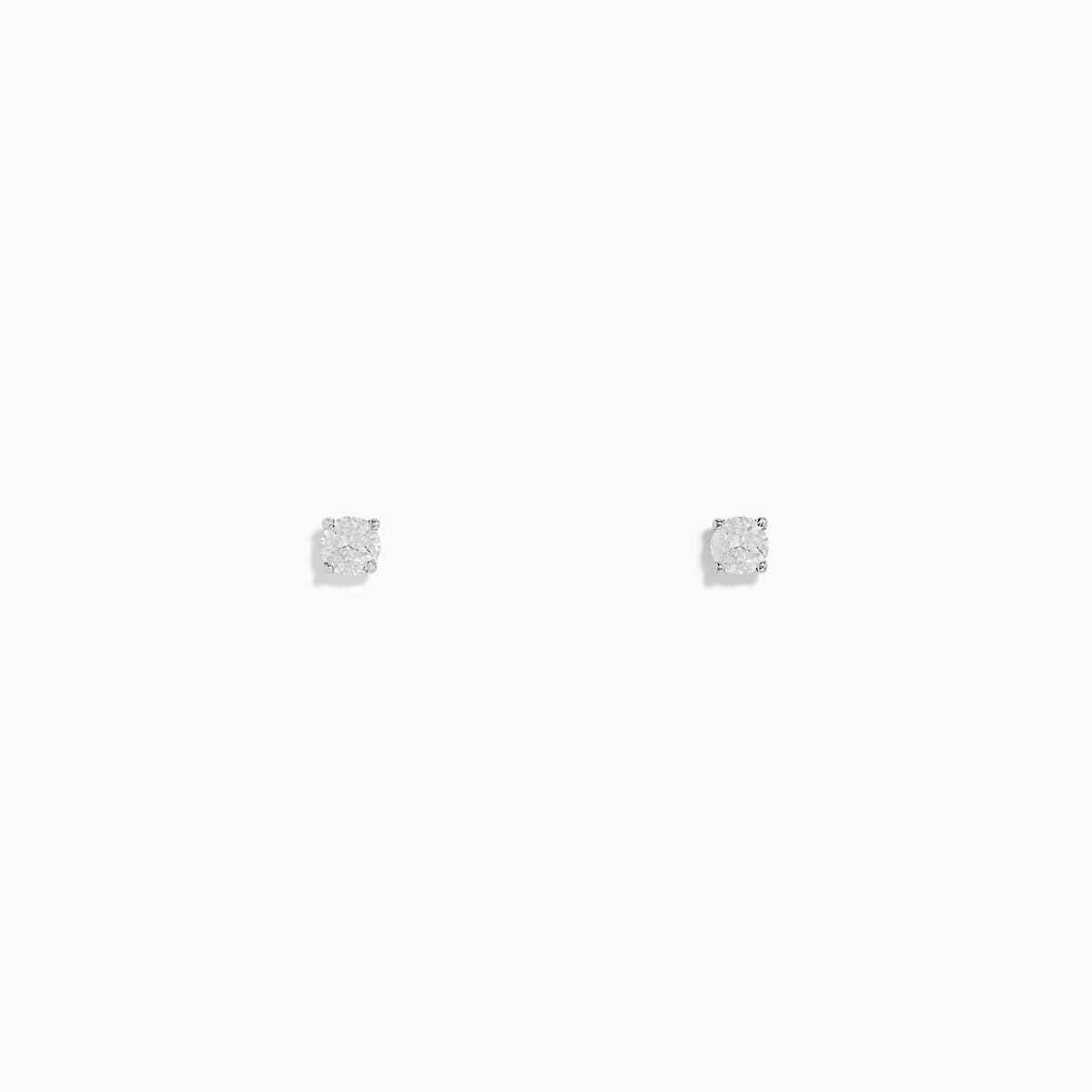 A pair of 14K White Gold Diamond Solitaire Stud Earrings, 0.15 TCW, featuring small round diamonds in a simple prong setting, displayed on a plain white background.