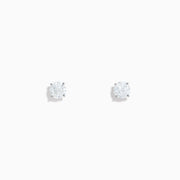 The 14K White Gold Diamond Solitaire Stud Earrings, 0.75 TCW, feature small round diamonds in silver prongs and are shown on a plain white background.