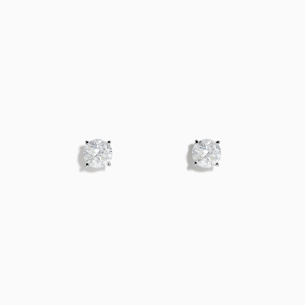 The 14K White Gold Diamond Solitaire Stud Earrings, 1.0 TCW, feature round diamonds in silver prongs and are shown on a plain white background.