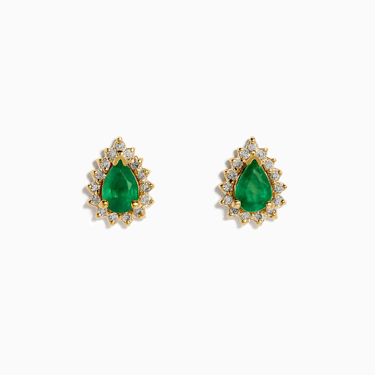 The 14K Yellow Gold Pear Emerald and Diamond Halo Stud Earrings showcase teardrop green emeralds encircled by sparkling diamonds in a floral design.