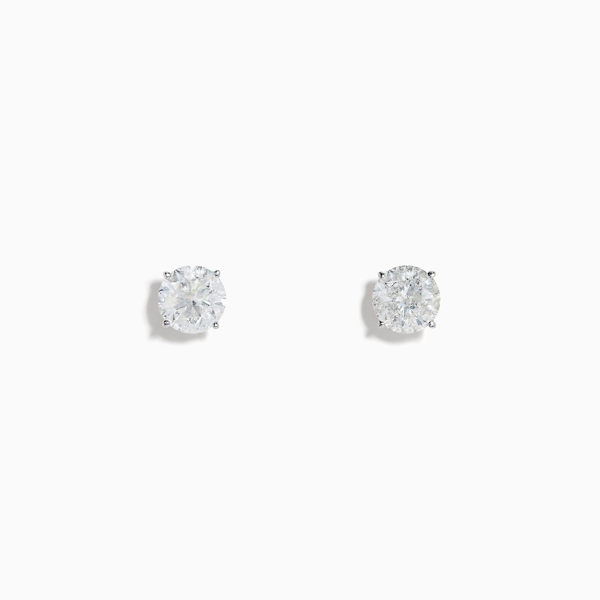 The 14K White Gold 1.18ct Brilliant Round Diamond Solitaire Stud Earrings feature sparkling diamonds in classic prong settings, showcased on a simple white background.