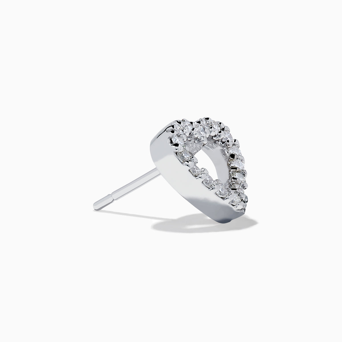 The 18K White Gold Diamond Heart Stud Earrings feature open-centered hearts outlined with sparkling diamonds, shown against a white background.