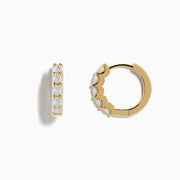 DOro 14 Karat Yellow Gold 5/8 Diamond Hoop Earrings with a total carat weight of 0.98, each set with five sparkling diamonds, displayed against a white background.