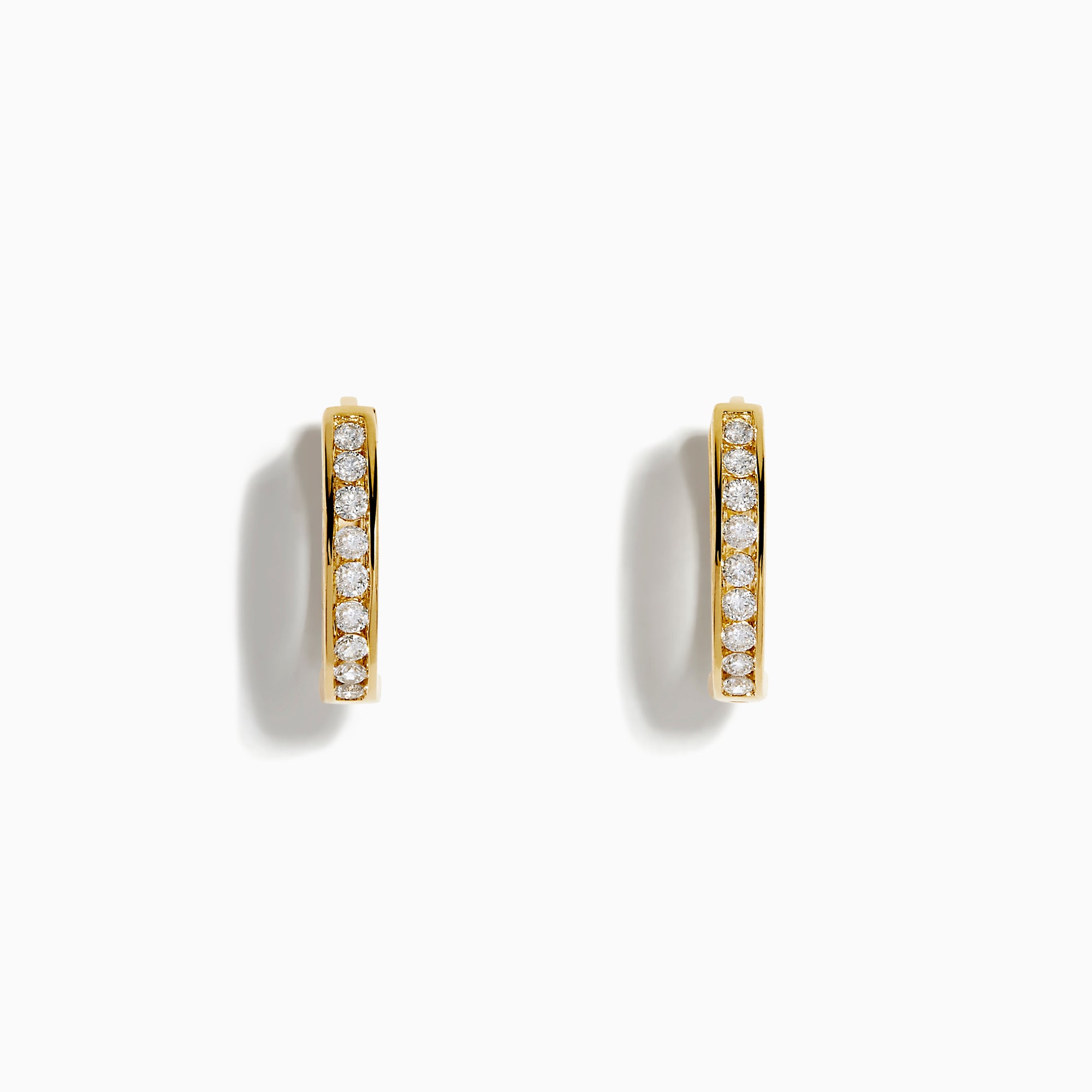 The 14K Yellow Gold Channel Set Diamond Mini Hoop Earrings feature a row of sparkling round diamonds, elegantly displayed on a white background.