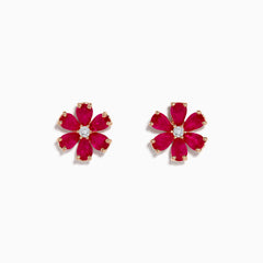 The 14K Rose Gold Ruby Flower Earrings feature deep pink, ruby-like petals and a clear center gemstone, crafted in 14K rose gold and displayed on a white background.