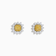 The Canare 18K Two Tone Gold White and Yellow Diamond Flower Earrings feature a central yellow gemstone encircled by white, teardrop-shaped stones, beautifully set against a white background.
