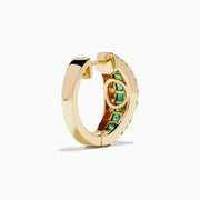 The Brasilica 14K Yellow Gold Emerald and Diamond Huggie Earrings feature a central row of green emeralds bordered by two rows of small white diamonds, shown on a white background.