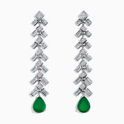 Brasilica 14K White Gold Emerald and Diamond Drop Earrings feature geometric silver and diamond shapes, each finishing with a teardrop-shaped emerald gemstone for an elegant, dangling look.
