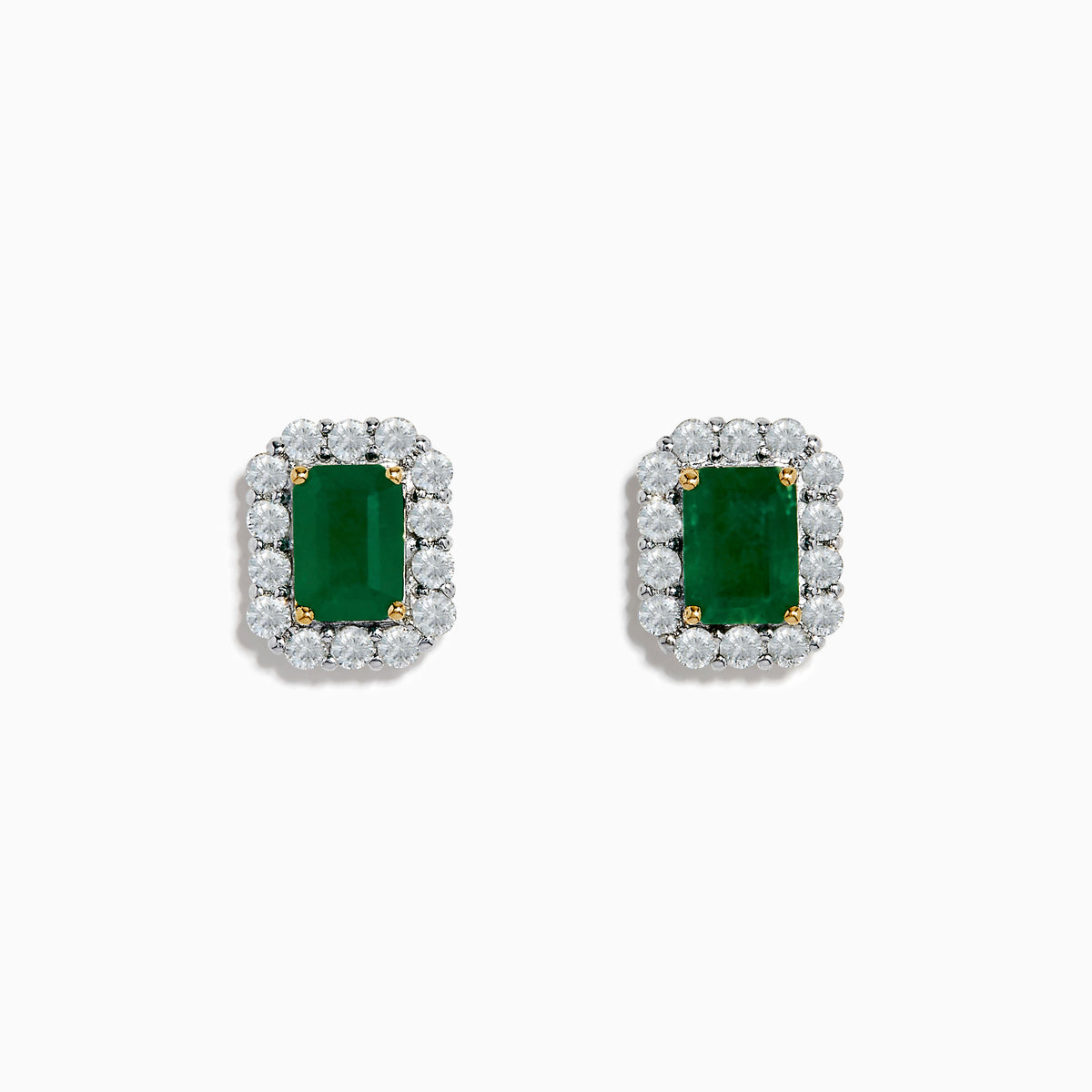 The 14K Two Tone Gold Emerald and Diamond Earrings feature rectangular emerald green studs bordered by round white stones, set in 14K gold. These earrings are shown on a plain white background.