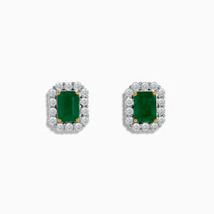 The 14K Two Tone Gold Emerald and Diamond Earrings feature rectangular emerald green studs bordered by round white stones, set in 14K gold. These earrings are shown on a plain white background.