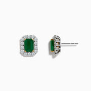 The 14K Two Tone Gold Emerald and Diamond Earrings feature rectangular emerald green studs bordered by round white stones, set in 14K gold. These earrings are shown on a plain white background.
