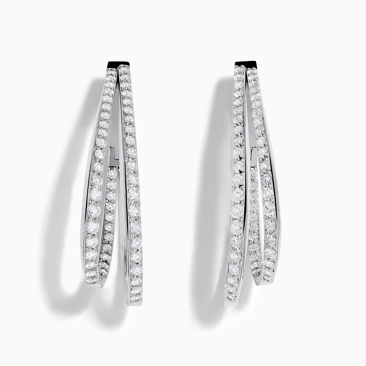 The 14K White Gold Diamond Double Hoop Earrings feature rows of sparkling diamonds on elegant double hoops, shown against a white background.