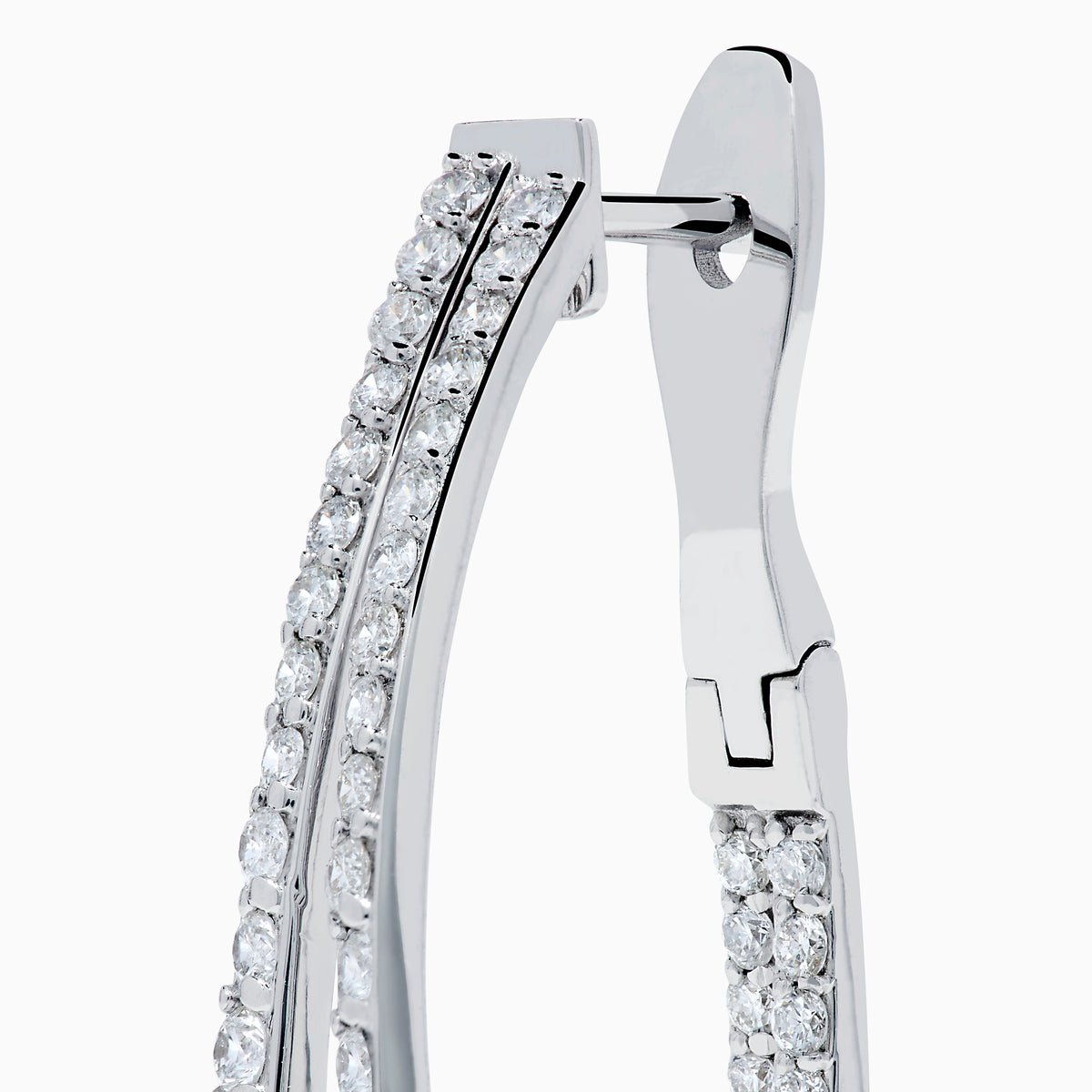 The 14K White Gold Diamond Double Hoop Earrings feature rows of sparkling diamonds on elegant double hoops, shown against a white background.