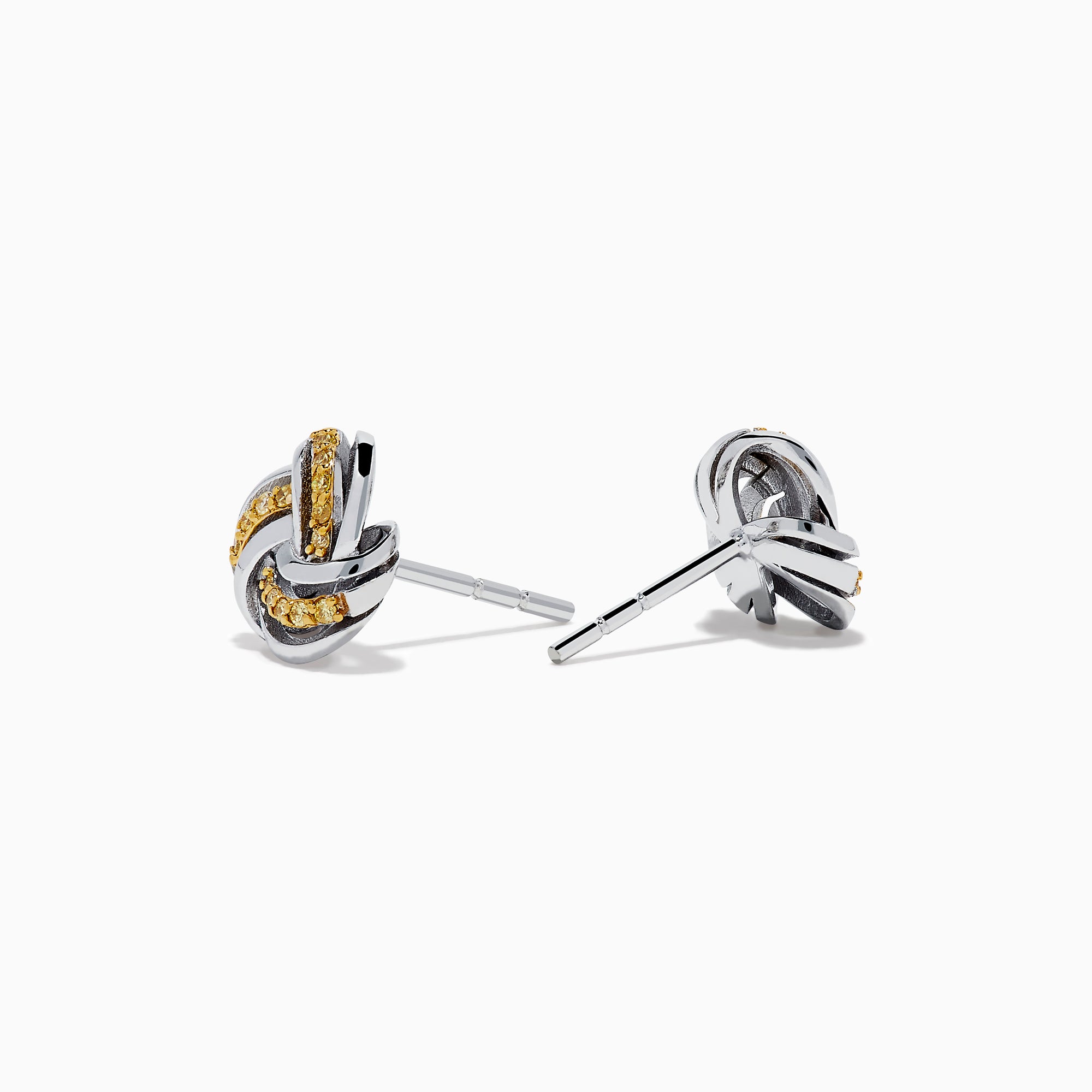 The 14K White Gold Yellow Diamond Love Knot Earrings feature an intricate love knot design with polished and textured finishes, crafted in 14K white gold, and are shown on a plain white background.