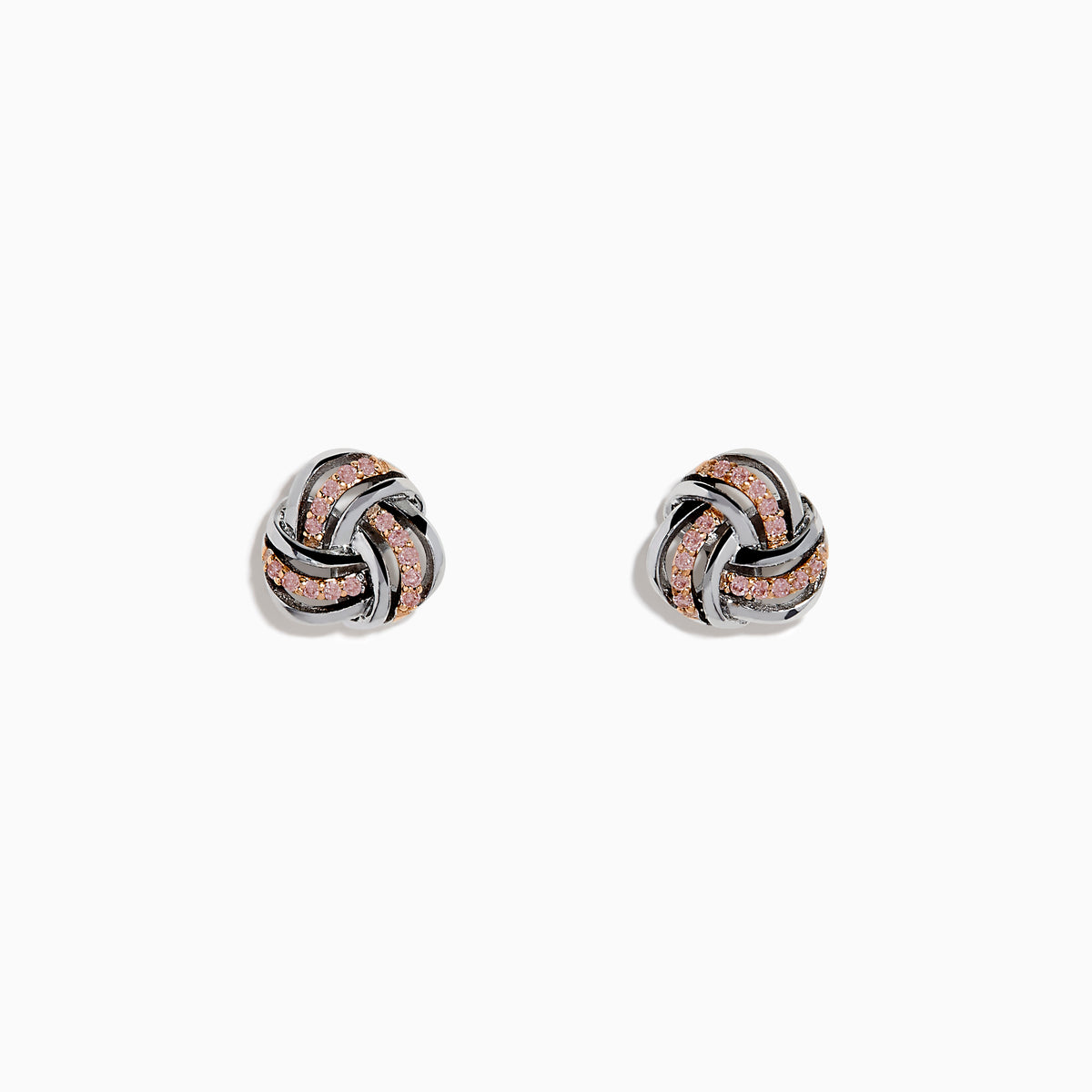 The 14K White Gold Pink Diamond Love Knot Earrings feature an intricate knot design in silver and rose gold tones, accented with sparkling pink diamonds. They are displayed against a plain white background.