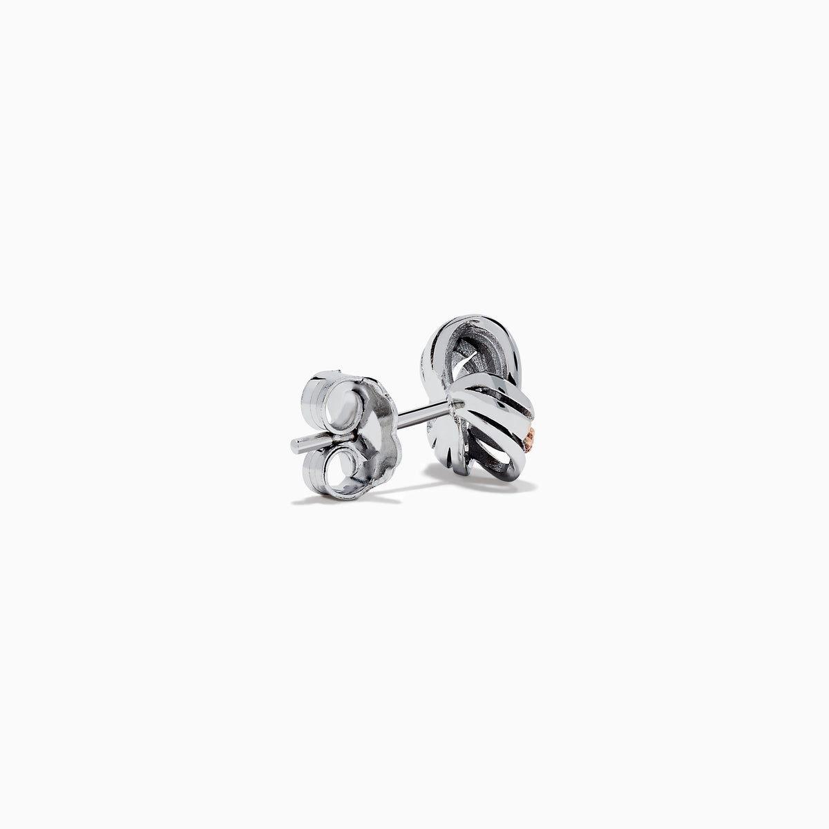The 14K White Gold Pink Diamond Love Knot Earrings feature an intricate knot design in silver and rose gold tones, accented with sparkling pink diamonds. They are displayed against a plain white background.
