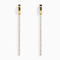 The 14K Yellow Gold Diamond Linear Bar Drop Huggie Earrings feature long, slender vertical bars accented with sparkling diamonds, displayed against a plain white background.