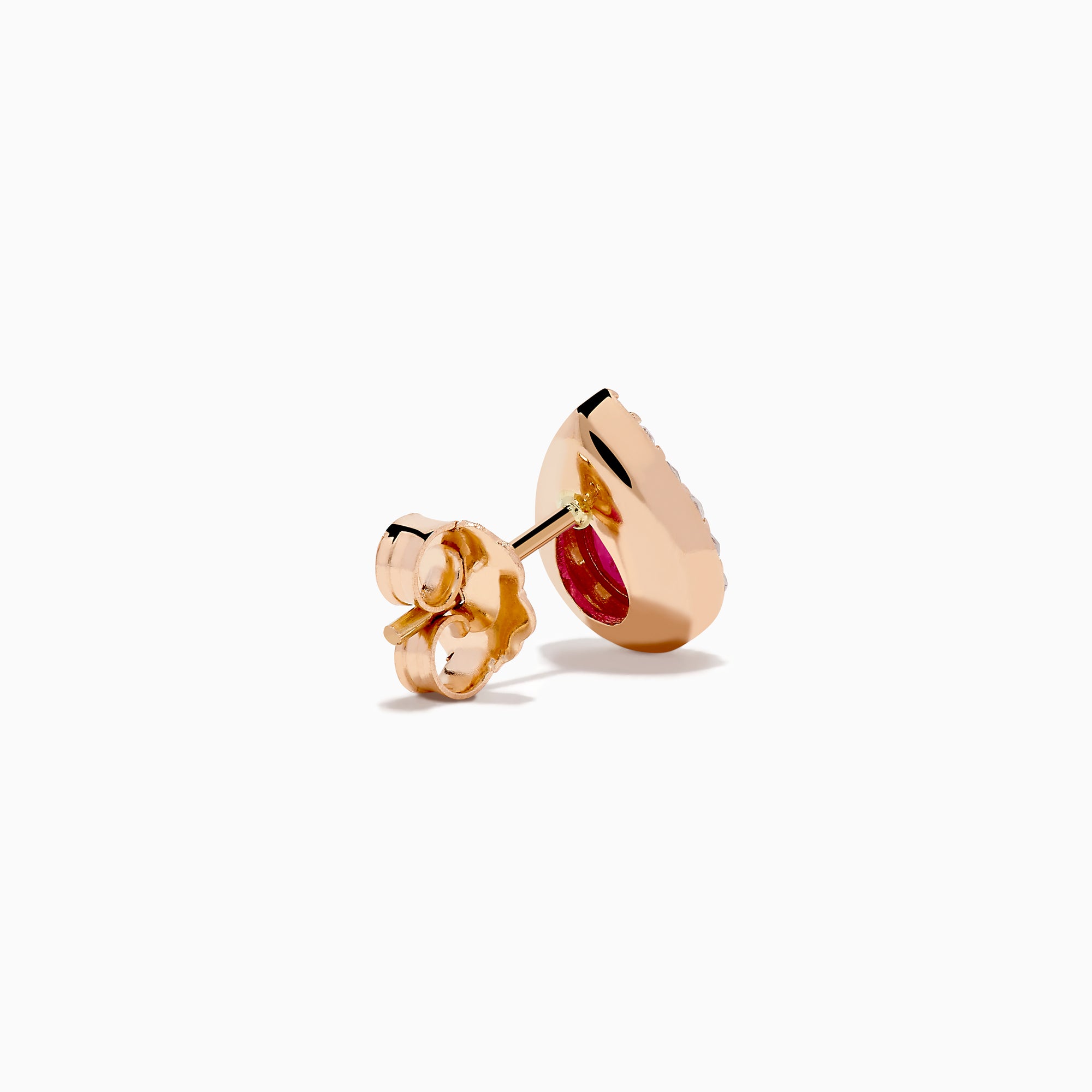 A pair of 14K rose gold ruby and diamond pear halo stud earrings with red rubies framed by diamonds, shown on a white background.
