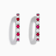 The 14K White Gold Ruby & Diamond Hoop Earrings, 3.58 TCW, feature alternating rubies and diamonds set in white gold hoops, shown on a white background.