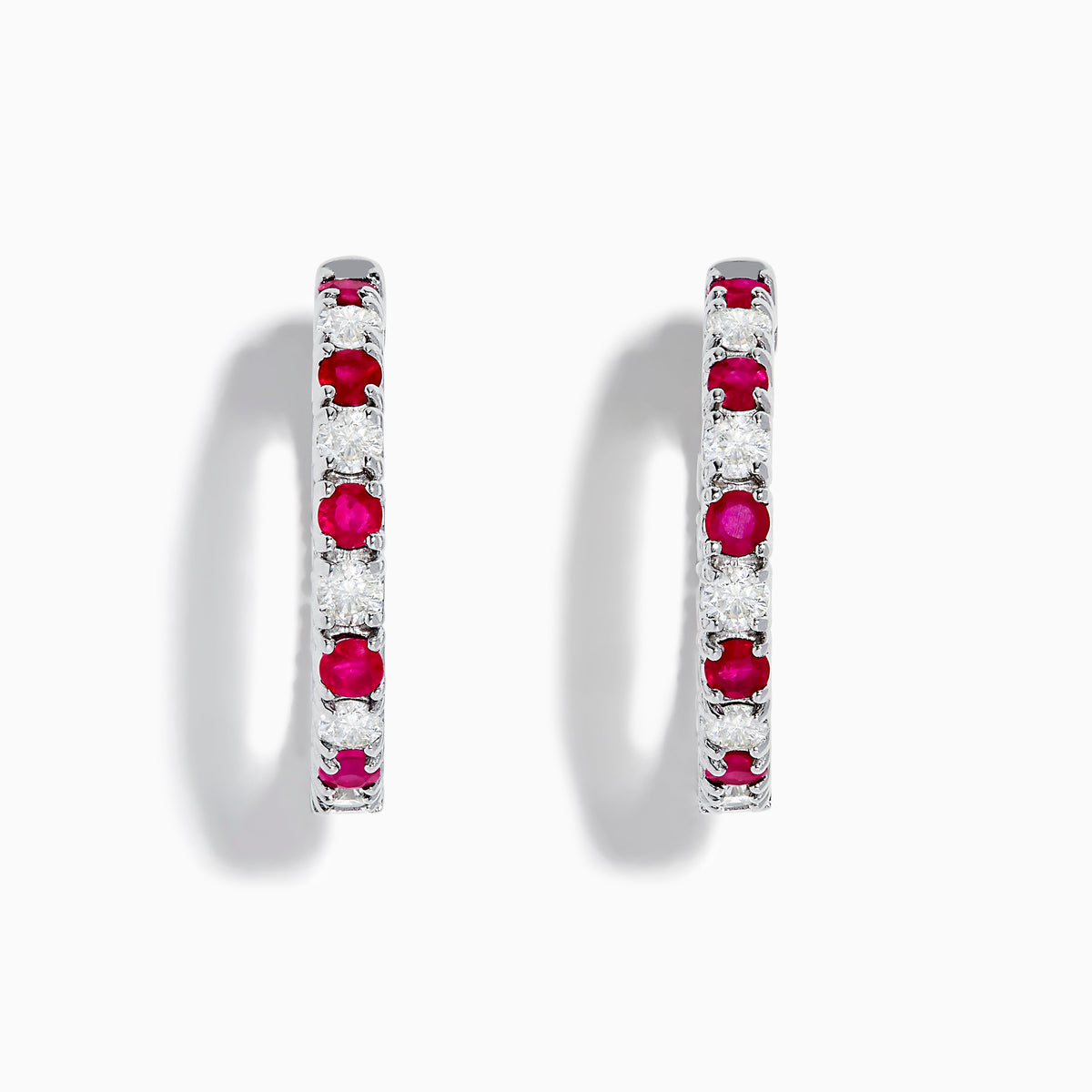 The 14K White Gold Ruby & Diamond Hoop Earrings, 3.58 TCW, feature alternating rubies and diamonds set in white gold hoops, shown on a white background.