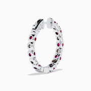 The 14K White Gold Ruby & Diamond Hoop Earrings, 3.58 TCW, feature alternating rubies and diamonds set in white gold hoops, shown on a white background.