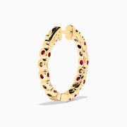 14K Yellow Gold Ruby & Diamond Hoop Earrings, 3.58 TCW, featuring alternating round red rubies and white diamonds, are displayed vertically on a white background.