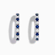 A pair of 14K White Gold Blue Sapphire & Diamond Hoop Earrings, 3.58 TCW, showcased against a plain white background.