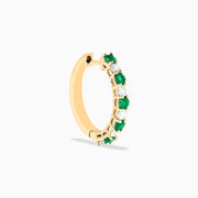 A pair of 14K Yellow Gold Emerald & Diamond Hoop Earrings, 1.35 TCW, featuring alternating round emeralds and diamonds, displayed on a white background.