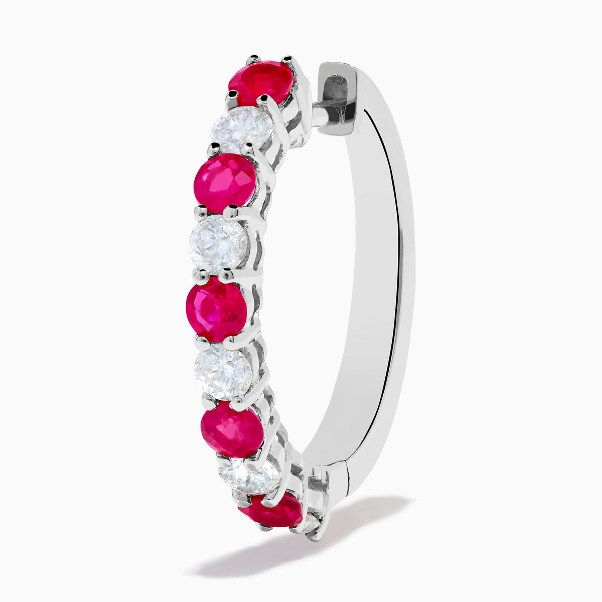 The 14K White Gold Ruby & Diamond Hoop Earrings, 1.35 TCW, feature alternating round red rubies and clear diamonds set in gleaming white gold, shown against a white background.