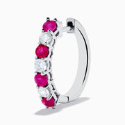 A pair of 14K White Gold Ruby & Diamond Hoop Earrings, 1.10 TCW, featuring alternating round red rubies and clear diamonds, displayed on a white background with each earring casting a soft shadow.