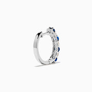 The 14K White Gold Blue Sapphire & Diamond Hoop Earrings, 1.10 TCW, are shown on a plain white background with soft left-side shadows, highlighting alternating sapphire and diamond stones.