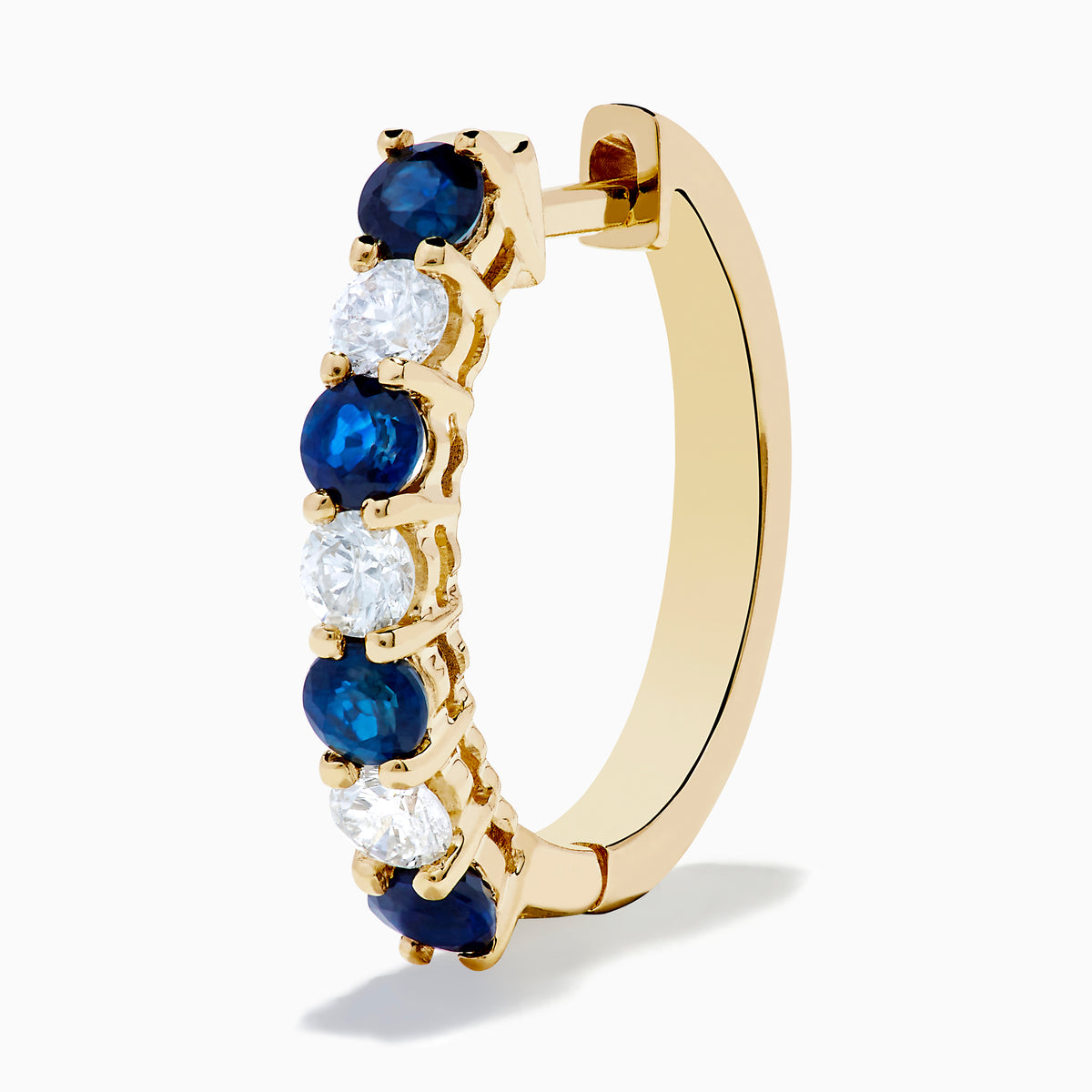 The 14K Yellow Gold Blue Sapphire & Diamond Hoop Earrings, 1.10 TCW, feature alternating sapphires and diamonds in a classic hoop design, shown on a plain white background with visible shadows.