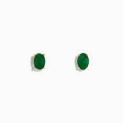 The Brasilica 14K Yellow Gold Emerald Stud Earrings feature oval-shaped emeralds set in yellow gold prongs, shown against a plain white background.