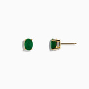 The Brasilica 14K Yellow Gold Emerald Stud Earrings feature oval-shaped emeralds set in yellow gold prongs, shown against a plain white background.
