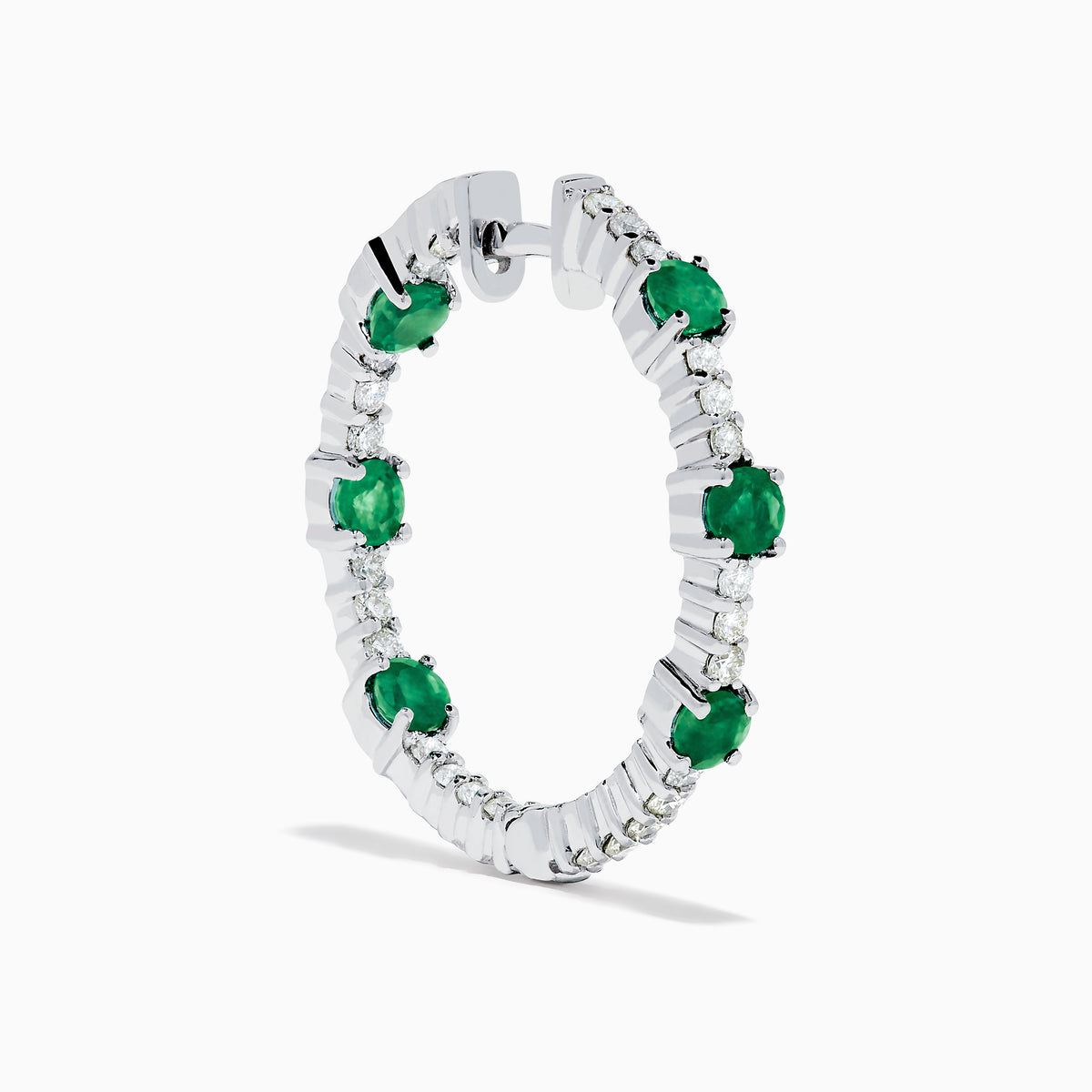 The 14K White Gold Emerald and Diamond Hoops showcase alternating round emeralds and diamonds in silver hoops, displayed against a white background.