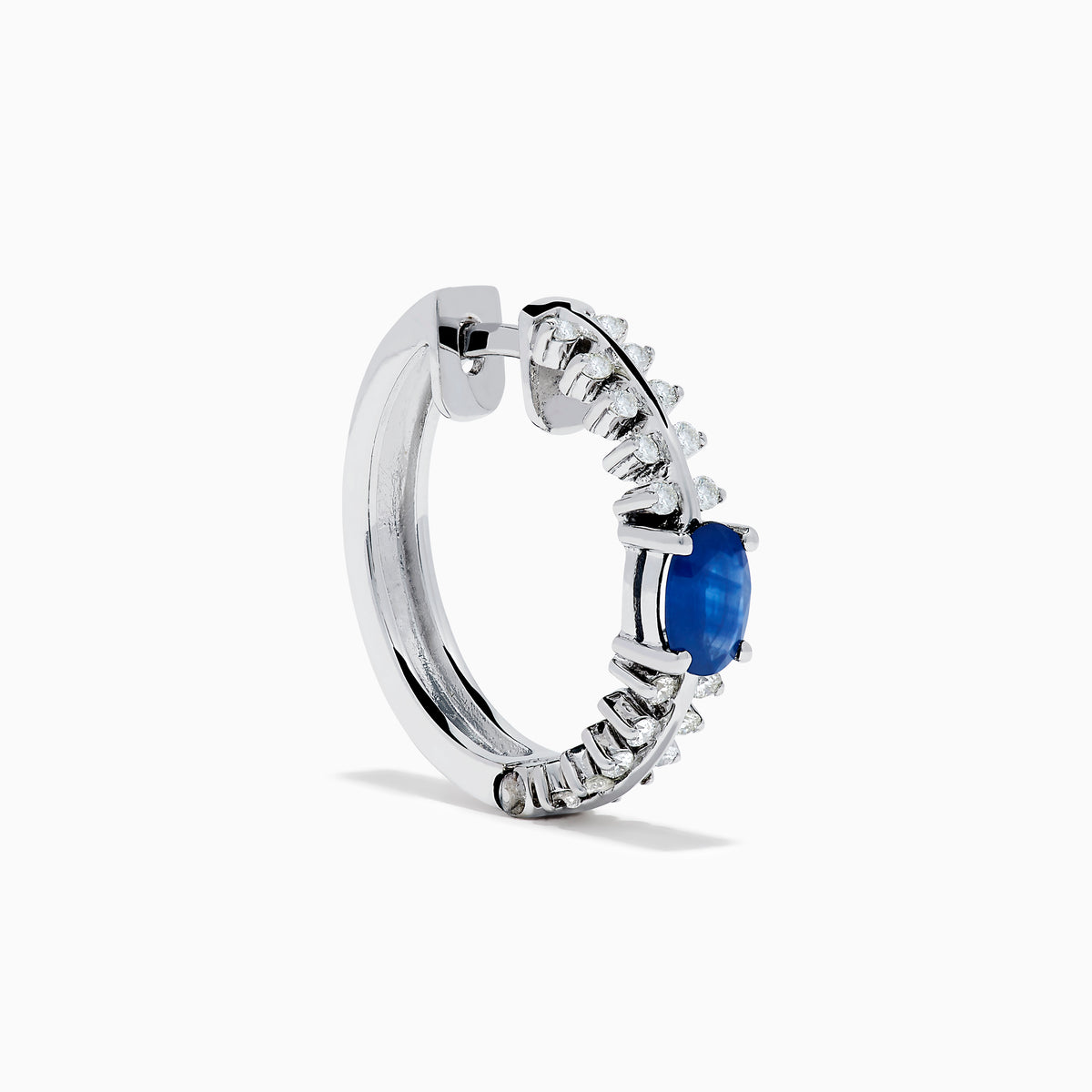 The 14K White Gold Blue Sapphire and Diamond Hoops feature an oval blue sapphire at the center, accented by rows of sparkling diamonds. Displayed on a plain white background.