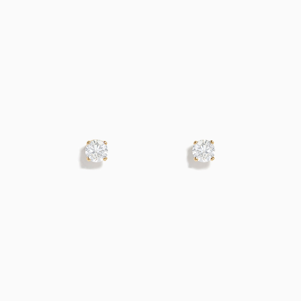The 14K Yellow Gold Diamond Solitaire Stud Earrings 0.50 TCW feature small, round diamonds in yellow gold prongs, shown against a plain white background.