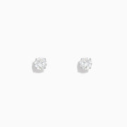 A pair of 14K White Gold Diamond Solitaire Stud Earrings, 0.75 TCW, featuring round sparkling diamonds in a classic prong setting against a plain white background.