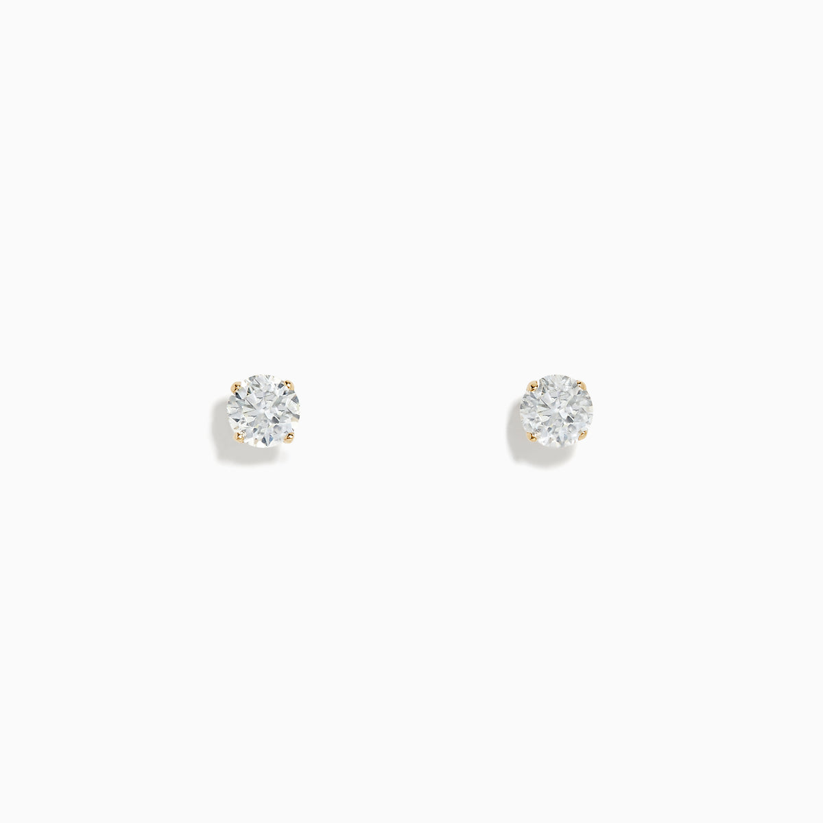 A pair of 14K Yellow Gold Diamond Solitaire Stud Earrings (0.75 TCW) are displayed against a white background.