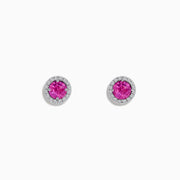 14K White Gold Pink Sapphire and Diamond Stud Earrings with round pink sapphires encircled by diamond halos, shown against a plain white background.