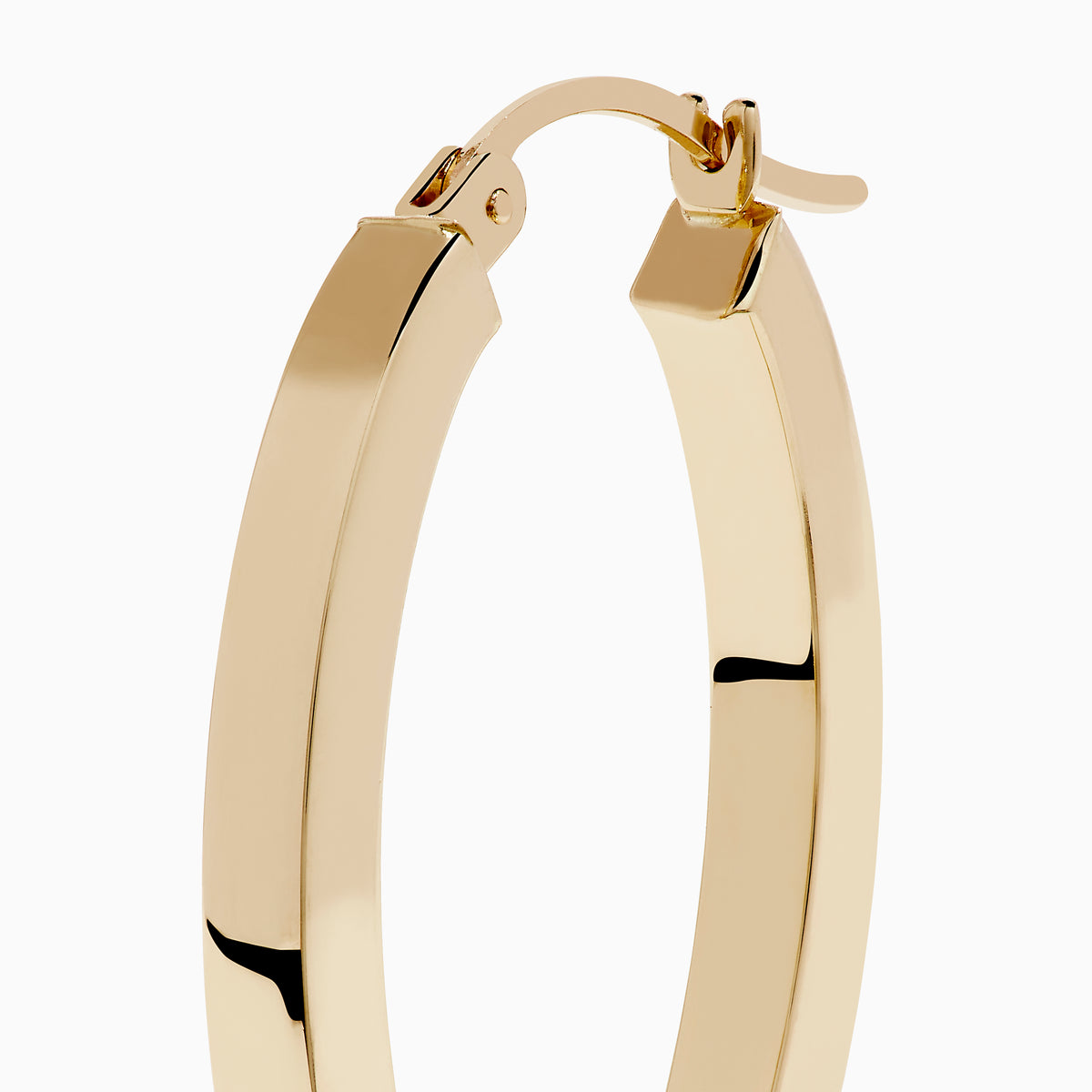 A pair of 14K Yellow Gold Square Tube Oval Hoop Earrings displayed vertically on a white background, casting soft shadows to the right.