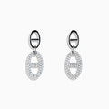 The 925 Sterling Silver Diamond Interlocking Link Earrings feature oval-shaped drops outlined with sparkling stones, each joined to a smaller oval loop for added diamond-inspired elegance.